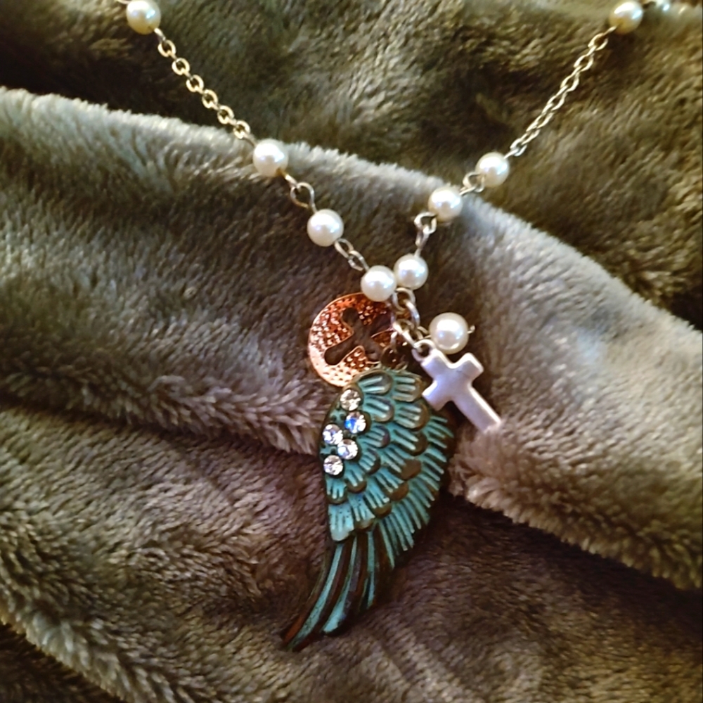 Angel wing and cross necklace